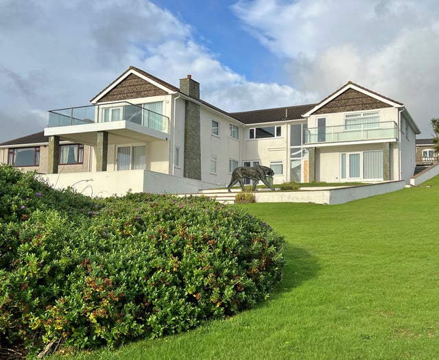 UK sanctions owner of homes raided in FBI operation