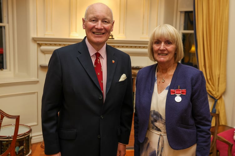 Lieutenant Governor Sir John Lorimer and Lady Lorimer hosted Karen Norton's BEM Investiture at Government House earlier this month (Photo by Callum Staley (CJS Photography)