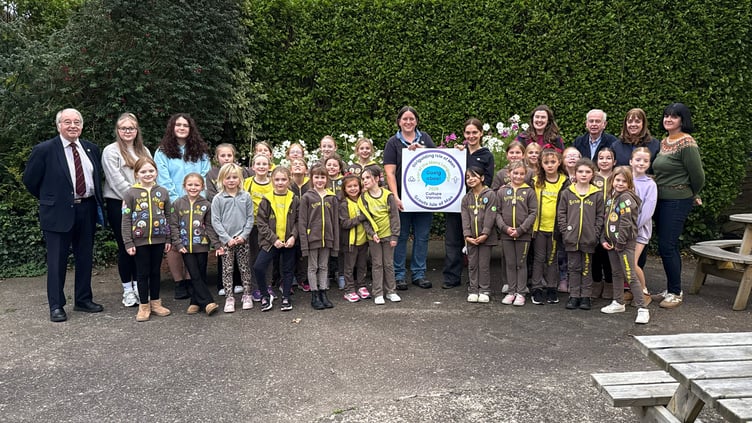 5th Douglas Brownies with their leaders and representatives from Culture Vannin and the Douglas Rotary Club