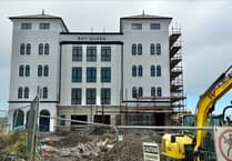 Pictures as the name 'Bay Queen' towers over village once more