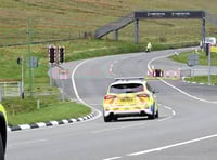 Person rescued after car plunges 20 feet off Mountain Road