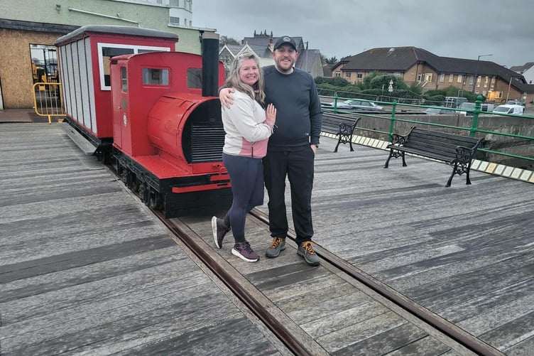 Elizabeth Whatnall and husband Joe visit Queen's Pier during her walking challenge around the coast of the British Isles