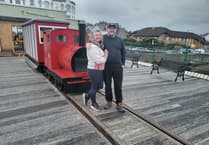 Woman visits Queen's Pier during epic 1,000-mile walking challenge