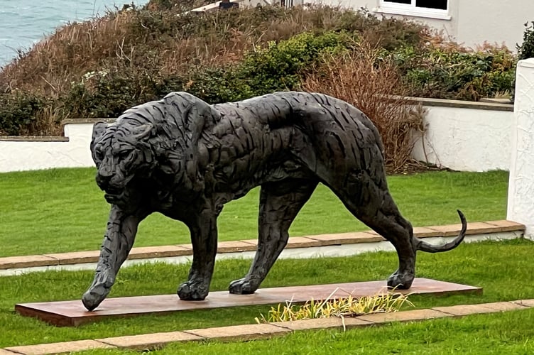 The big cat sculpture in the grounds of 38 Majestic View