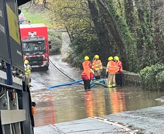 Police close road after 'significant flooding'
