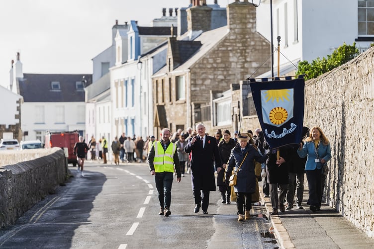 Buchan School pupils past and present march through Castletown along Douglas Street