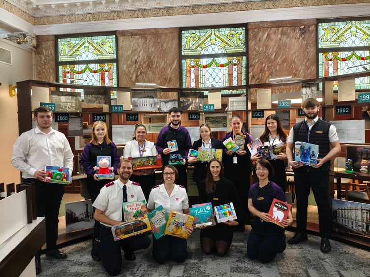 The Salvation Army's Captain Dylan and Rachael Nieuwoudt with employees from IOM Bank which will be a donation station for the church and charity's Christmas appeal