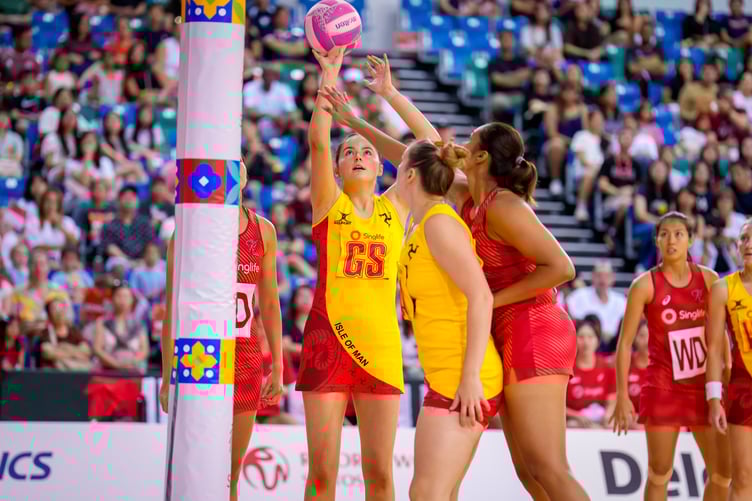 Isle of Man goal shooter Alice Cross in action against Singapore on Sunday (Photo: Netball Singapore)