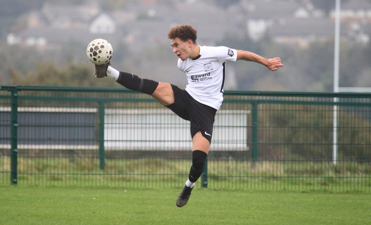 Corinthians winger Connor Clark acrobatically controls a high ball during his side's recent match with St Mary's in the Canada Life Premier League (Photo: Dave Norton)