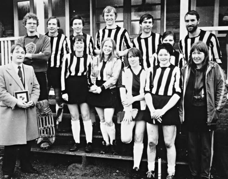 One of Vikings Hockey Club's winning cup teams from the 1980s pictured at Ronaldsway Sports Club, featuring: (back row, left to right) Paul Woods, Roy Corlett, Peter Duchars, the late Mike Maddrell, Andy Maddrell and Graham Crowe. (Front) a representative of cup sponsor Bushmills Whiskey, Jackie Clague, the late Sue Cowley, Karen Garrett, Irene Taggart, Sue Crowe (partially hidden) and Val Garrett