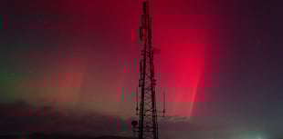 Photographs as Aurora Borealis lights up the sky