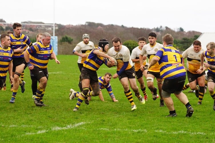 Vagabonds' Dan Bonwick on the charge against Dukinfield at Ballafletcher on Saturday (Photo: John Liver/Mumbles Pics)