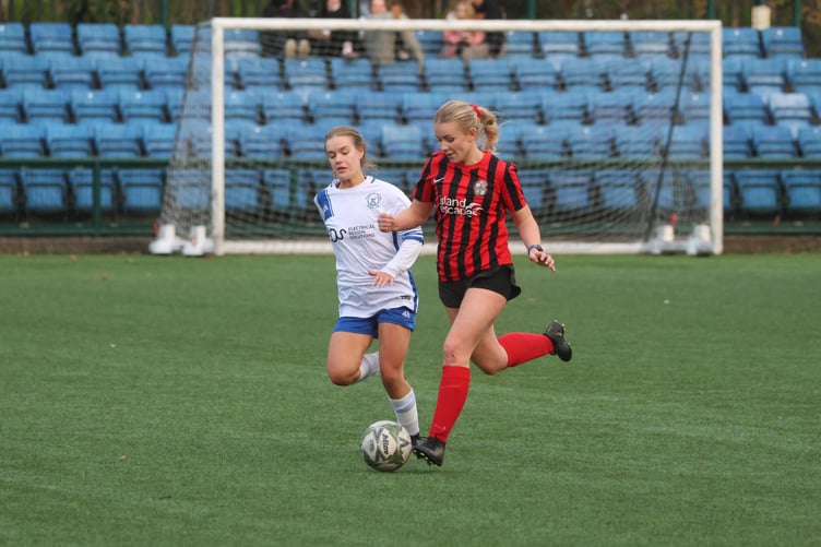 Douglas Royal's Charley Bell (left) and Malew's Ashleigh Lachenicht (Photo: Paul Hatton)