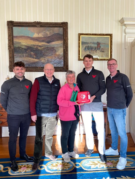 The Lieutenant Governor Sir John Lorimer and Lady Lorimer with Craig's Heartstrong Foundation members Joshua Ridings, Luke Murray and Paul Healey