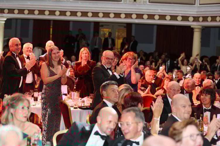Guests and winners were often on their feet applauding the very best of Manx talent . 