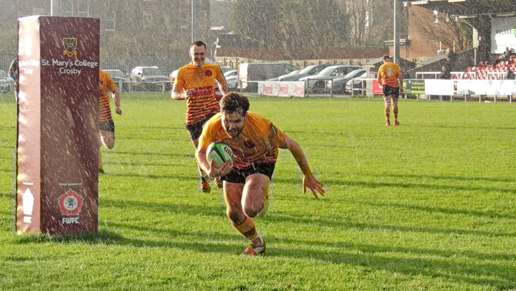 Matty Wood dives over to score a try for Douglas against Firwood Waterloo at Blundellsands on Saturday afternoon (Photo: Tony Wilson-Spratt)