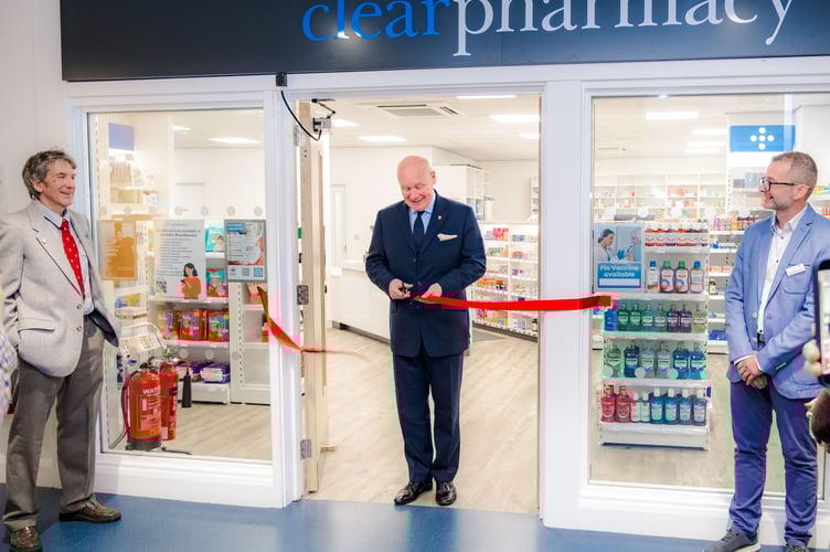 His Excellency the Lieutenant Governor, Lady Lorimer and their young shadow, Aaron Crellin, officially opened the new Clear Pharmacy in Braddan's Roundhouse