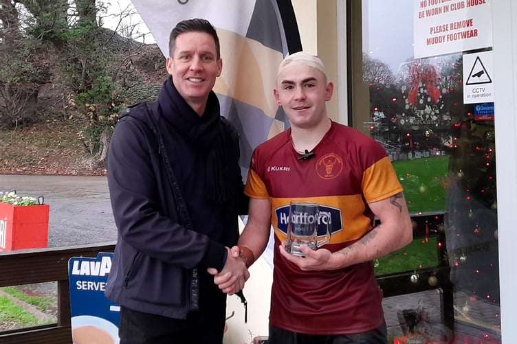 Nathan Robson receives his man of the match award from Ciaran Doherty of the Tevir Group after Saturday's clash at Port-e-Chee (Photo: Richard Ebbutt)