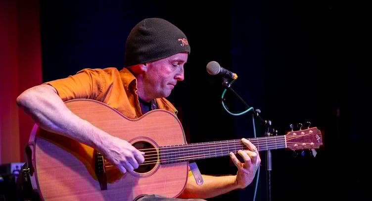 Mark Lawrence on guitar