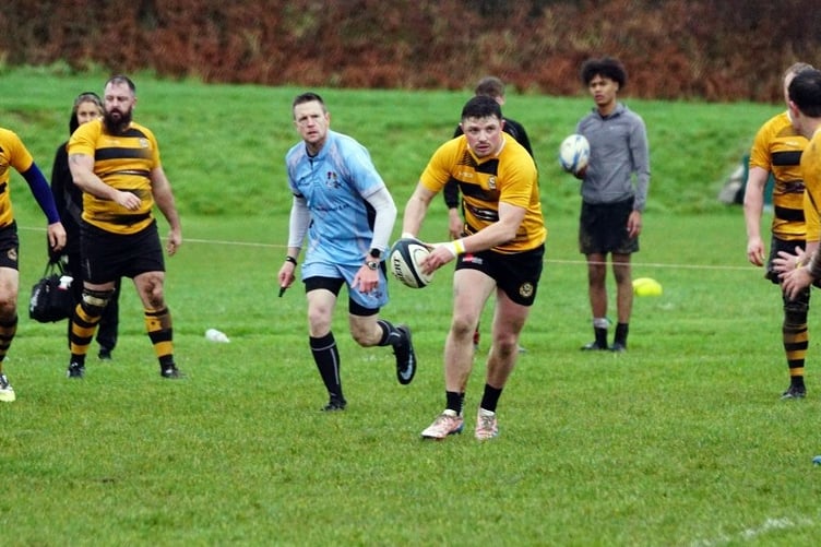 Vagabonds Cam Findlay looks to pass the ball out during Saturday's defeat at the hands of Bury (Photo: John Liver/Mumbles Pics)