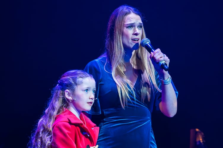 Seven-year-old Kitty Kilgallon and Sally-Anne Wilson performing 'Where Are You Christmas'
