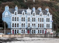 Man banned from pubs after throwing plastic pint glass at barman
