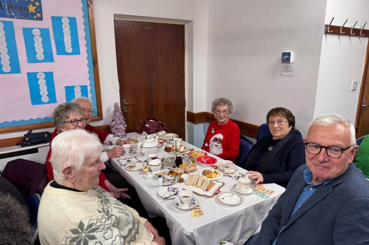 Captain of the Parish Charles Fargher MBE (right) with friends and supporters of the Playing Fields