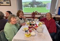 Pictures as festive afternoon tea raises record total for village playing fields