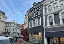 Road closed reopens after repairs carried out to building's storm-damaged window