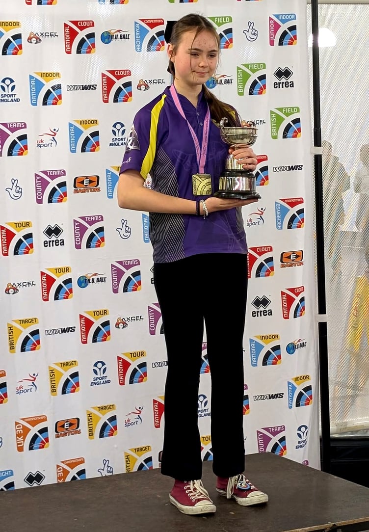 Erin Hainge on the top step of the podium after winning the under-16s trophy at the National Indoor Championships last weekend