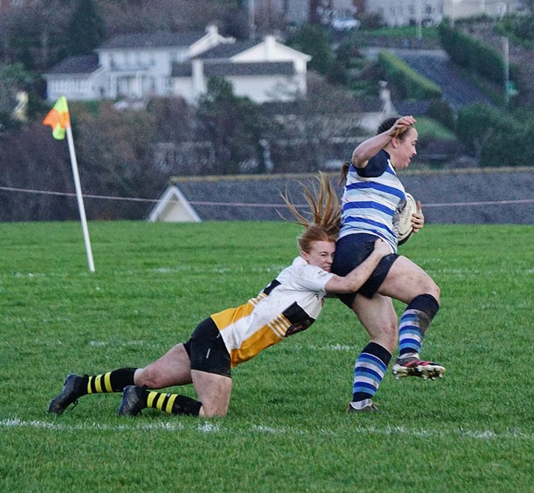 Vagabonds' Holly Scott tackles a Winnington Park opponent during the two sides' recent league meeting at Ballafletcher (Photo: John Liver/Mumbles Pics)