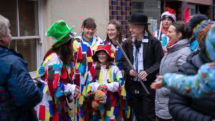 The White Boys are named for their white outfits decorated with colourful ribbons