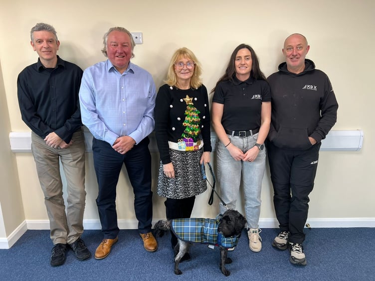 Left to right: Colin Williamson and David Johnson from Sterling Group, Lesley Nicholson and Dennis, and Saskia Kelly and Ian Kelly from K9 X