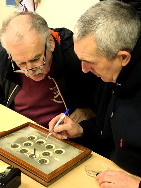 Castletown captain Andrew Bell and Port St Mary’s Les Crowe mark the cards after Monday night’s southern derby last week