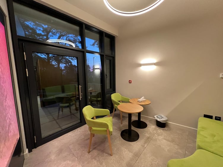 A relaxed seating area looking out towards the back garden space