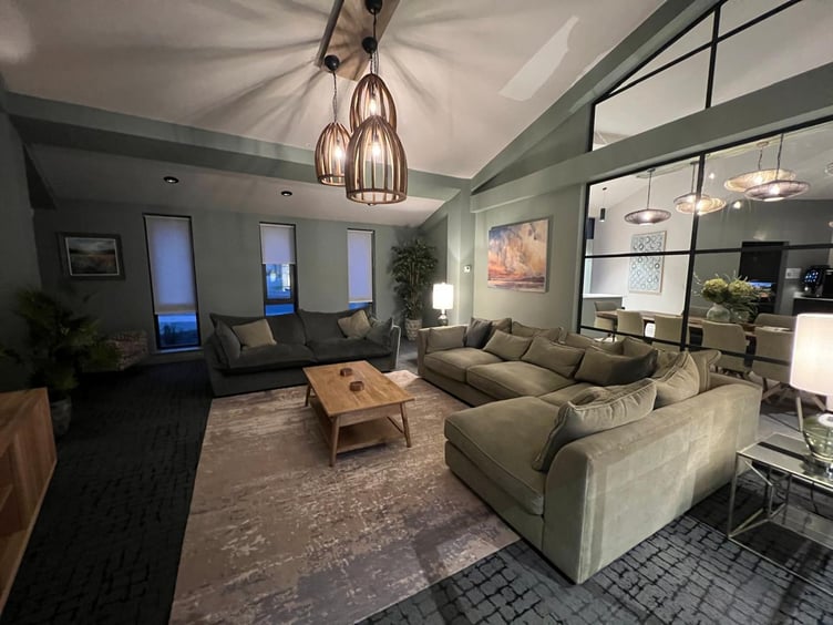 The main lounge area situated next to the kitchen