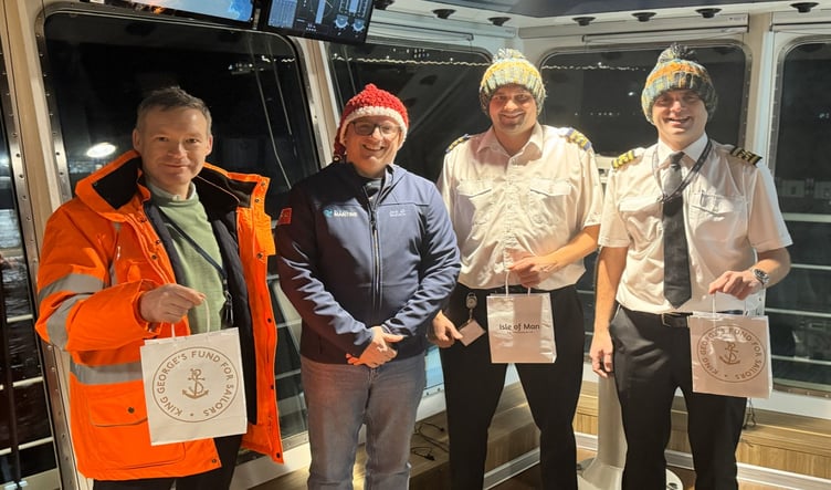 Trustees and supporters delivering festive gifts to seafarers on board the Steam Packet's Manxman