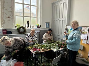 Nurses spread Christmas cheer with wreath-making