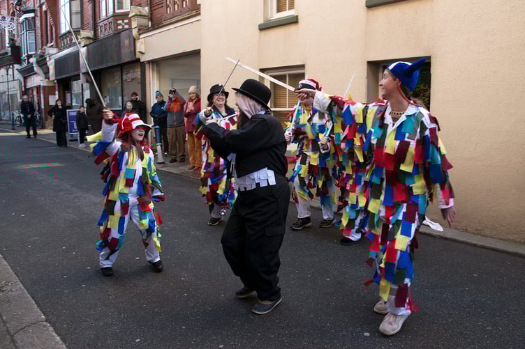 The White Boys are named for their white outfits decorated with colourful ribbons