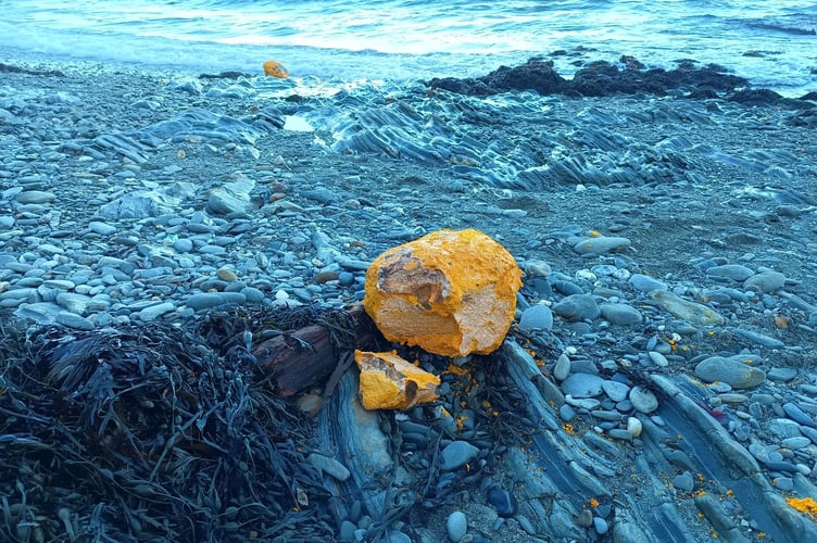 Substance thought to be pal oil has been washed up on Garwick beach in Baldrine