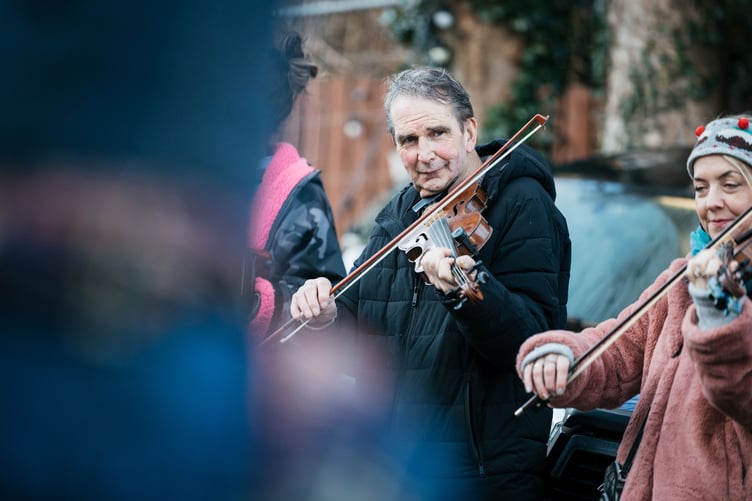 The violins were out to accompany the dancing