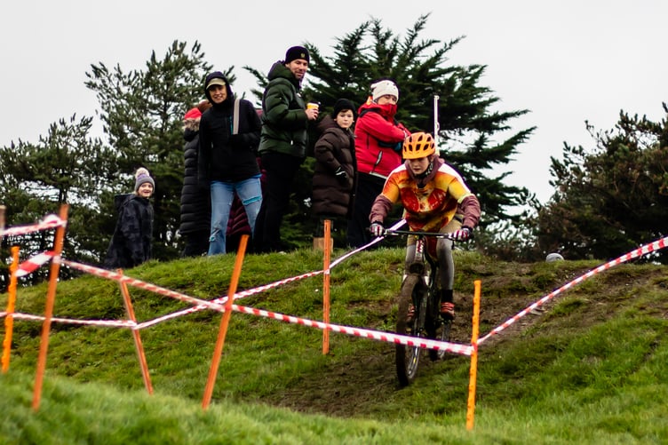 Oliver Kennington in action under the watchful eye of Sir Mark Cavendish who was back in the island for Christmas (Photo: Gary Jones/Manxman Photos)