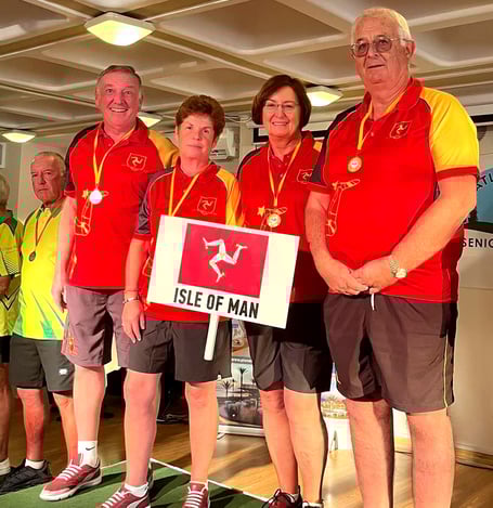 The Manx mixed quartet celebrate on the podium with their gold medals at the Atlantic Senior Fours in Paphos, Cyprus recently