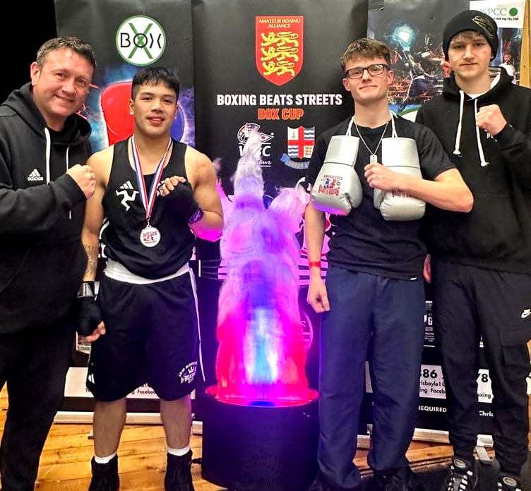 (Left to right) IoM Northern Boxing Club coach Tony Bullock with fighters Sean Leonardo, Max Jones and Finnley Richards at the event in Sheffield
