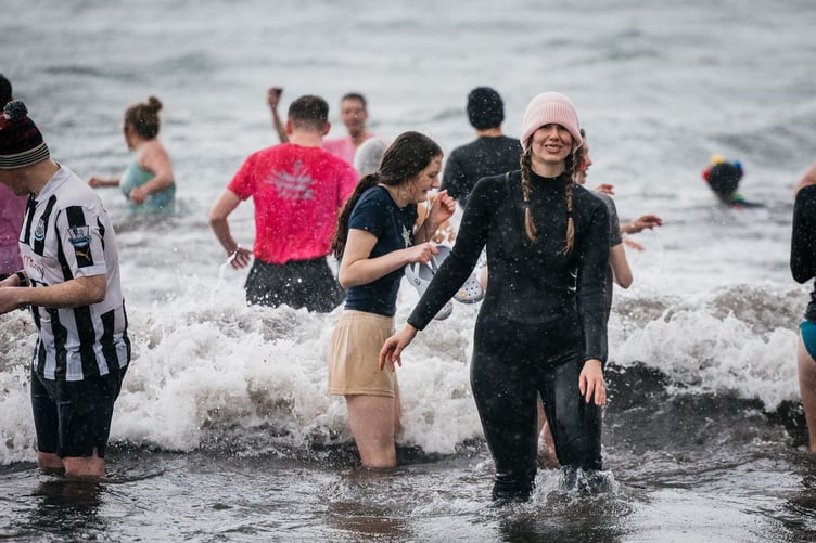 Not the warmest swim they will have at Peel beach this year