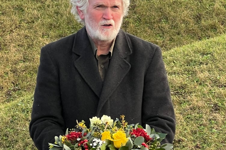 Mec Vannin chairman Mark Kermode with the wreath to mark the anniversary of Illiam Dhone's execution