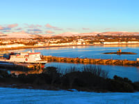 Snow LIVE updates as schools set to open and airport reopens