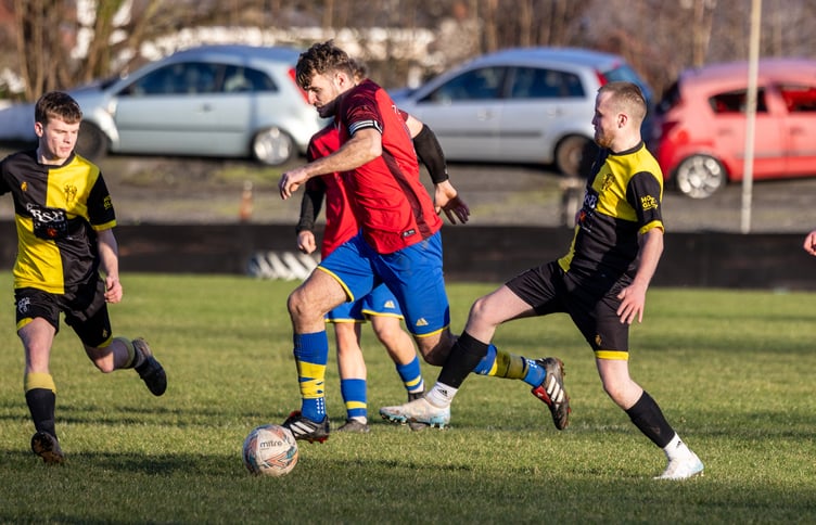 James Kerruish (centre) impressed for Onchan against St George's last Saturday to earn his place in Team of the Week (Photo: Gary Weightman)