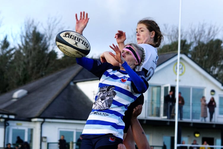 Vagabonds' Charlotte Hird (right) battles with a Winnington Park opponent for a lineout during the two sides' recent meeting (Photo: John Liver/Mumbles Pics)