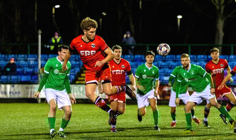 FC Isle of Man's Shaun Kelly directs a header goalwards during the weekend's clash with Burscough at the Bowl (Photo: Hannah McHugh)